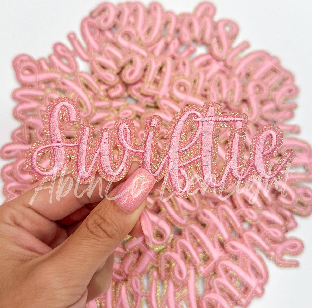 ABLN Boutique - Swiftie pink cursive script letter patch iron on 